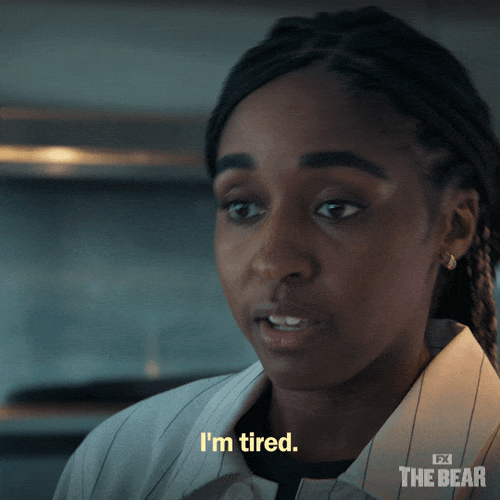 Sydney from The Bear looks drained, her face weary—“I’ve been tired, but I’m really tired.”_nonprofit humour