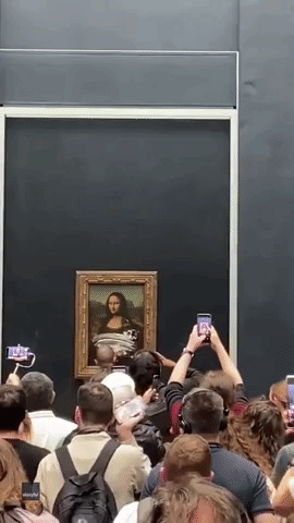 Mona Lisa Hit With Cake in Environmental Protest