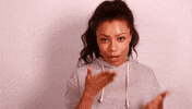 Celebrity gif. Actress Shalita Grant enthusiastically blows bunches of kisses with both hands. 