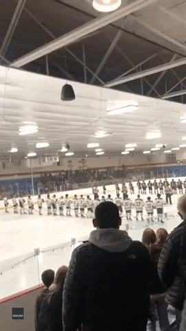 High School Hockey Fans Roar National Anthem After Audio Glitch