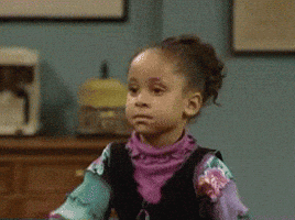 TV gif. Raven Symoné as Olivia on the Cosby Show slaps her hand to her forehand and throws her head back disapprovingly.