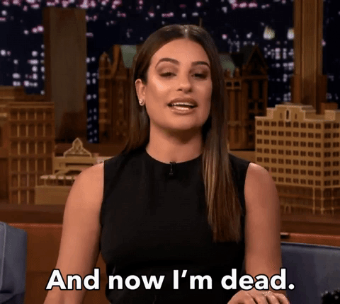Celebrity gif. Lea Michele raises both hands and flips her palms over with a matter of fact expression. Text, "And now I'm dead."