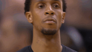 Sports gif. Basketball player Ish Smith's eyes and mouth widen in shock as he mouths "Oh."
