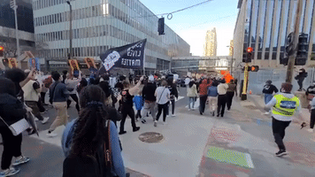 Protesters March in Minneapolis Streets After First Day of Derek Chauvin Trial