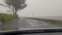 Storm Waves Crash Over Sea Wall Along South Irish Coast