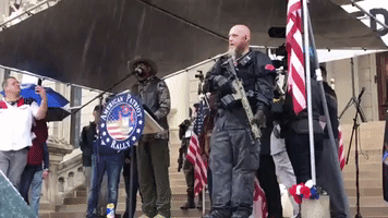 Armed Protesters Seen at Rally Against Michigan's COVID-19 Emergency Measures