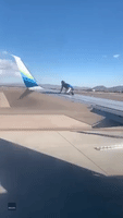 'The Original Wingman': Man Climbs Wing of Grounded Airplane at Las Vegas Airport