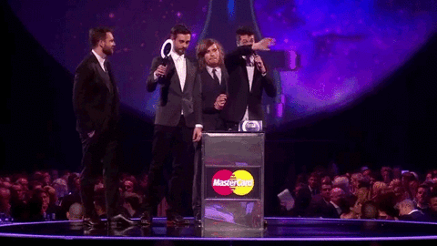 dan waving GIF by BRIT Awards