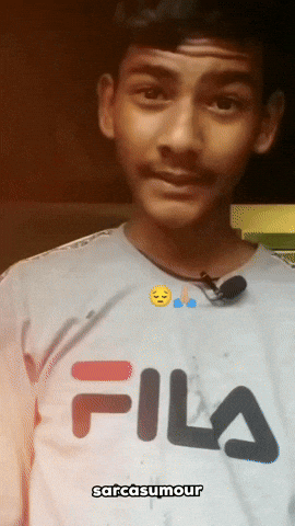 Video gif. A young man gratefully and emphatically points directly at us while his face breaks out into a teary smile. He says, "Chii," which appears as text. 