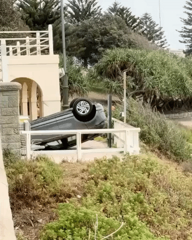 Car Lands on Roof After Crashing Through Fence at Bondi Beach