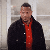 TV gif. Marlon Wayans as Marlon in Marlon jerks his head up straight and raises his eyebrows.