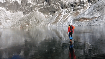 Hikers Walk on Crystal Clear Ice in Slovak Mountains