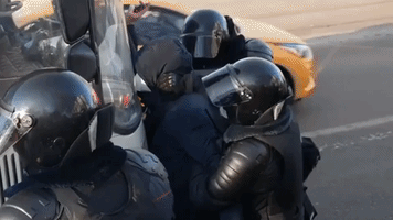 Russian Police Detain 'Hundreds' Outside Navalny Court Hearing