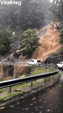 Flooding Waterfall Threatens Bridge