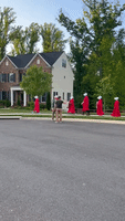 Pro-Abortion Rights Protesters March Near Justice Barrett's House Dressed in 'Handmaid's Tale' Costumes