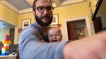 Dad Plays 'Winter Cold Blues' to Keep His Infant Son Calm