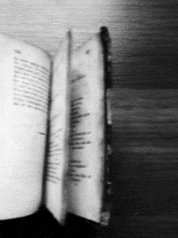 black and white book GIF