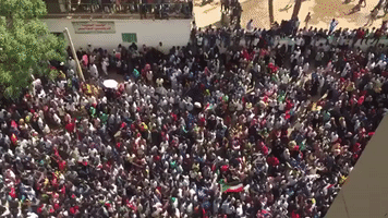 Crowds Gather on Khartoum Streets After President Toppled by Military