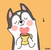 Illustrated gif. A blushing husky with a heart on its forehead holds a steaming mug that also has hearts coming out of it. Music notes surround the pup while it dances in cozy pleasure.
