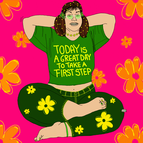 Digital art gif. Cartoon of a groovy hippie woman wearing round green sunglasses, with green beads in her hair and yellow flowers on her green pants, sits cross-legged with her hands clasped behind her head. Text on her t-shirt reads, "Today is a great day to take a first step." All of this is against a pink background with bright orange flowers.