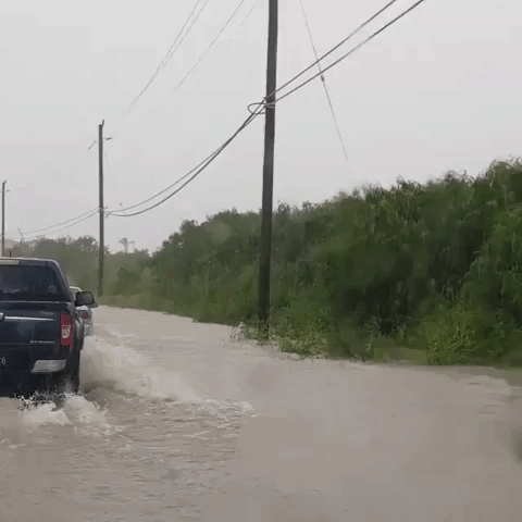 Drivers Navigate Flooded Roads After Deluge in Barbados