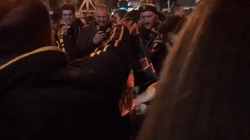 Tigers Fans Burn Giants Scarf After AFL Grand Final in Melbourne, Australia