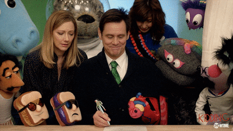 Jim_Carrey giphyupload movie toys jim carrey GIF