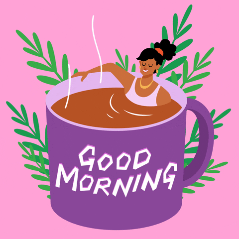 Illustrated gif. A woman lounges happily in a steaming coffee cup, treating it like a jacuzzi. There are green leaves adorning the background. Text, "Good Morning."