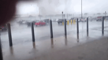 Violent Weather Rips Through Texas Walmart Parking