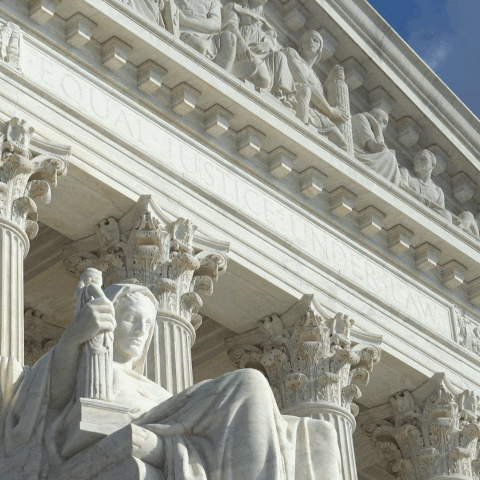 Photo gif. Closeup of the frieze of the Supreme Court Building. Inscription reads, "Equal justice under the law," before it's replaced by the words, "Environmental justice under the law."