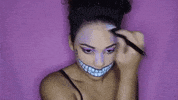 cheshire cat halloween costume GIF by StyleHaul