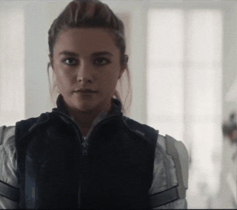 Yelena in Black Widow suit, standing and staring before her