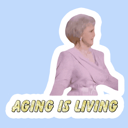Celebrity gif. Betty White wears a pink dress and she shimmies while dancing in a circle and text below her reads, "Aging is living."