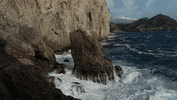 direzioneverticale wave ocean sea climbing GIF