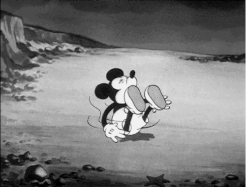 mickey mouse spinning GIF