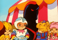 rainbow brite shrug GIF