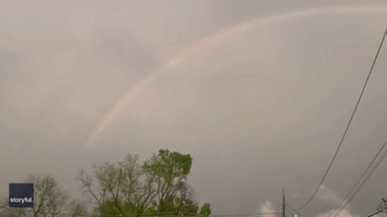 Lightning Streaks Across Rainbow During Louisiana Thunderstorm