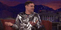 Flula Borg Shrug GIF by Team Coco