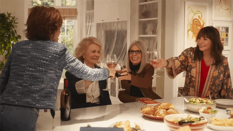 People discussing books at a book club meeting