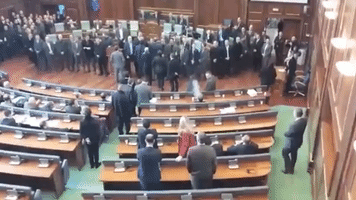 Opposition Lawmakers Disrupt Parliament Session With Tear Gas