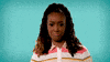 Video gif. Franchesca Ramsey sways with her brow furrowed and her mouth in a taut smile as she says, "Oh, okay."