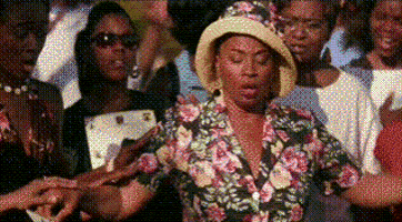 Meme gif. Jenifer Lewis as Aunt Lettuce in Dirty Laundry, chewing the scenery as loses her footing, fainting back into the arms of others.