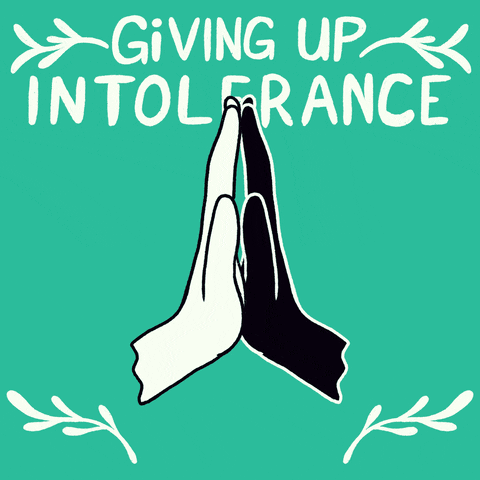Illustrated gif. White and black hands press together in the center, then form a heart together. White text against a teal background reads "Giving up intolerance for Lent."