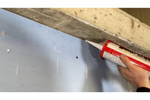 iKoustic giphyupload how to soundproof a wall acoustic sealant into a wall GIF