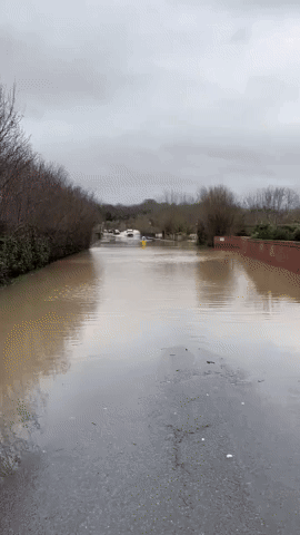 Cars Drive Through Storm Henk Floodwaters in Worcestershire