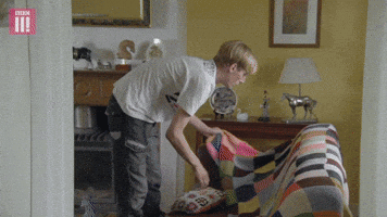Making sure the house is straight.