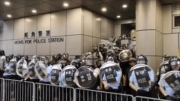 Protesters Shine Lasers at Police in Mong Kok