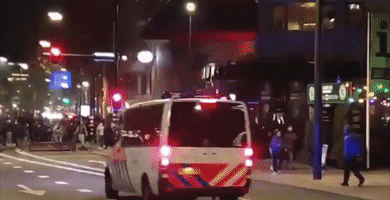 Object Thrown at Emergency Services Vehicle During Rotterdam COVID-19 Protest