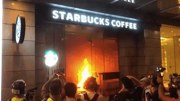 Starbucks Lit on Fire as Hong Kong Anti-Mask Law Protests Turn Violent