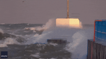 Huge Sideways Waves Slam Into Lake Michigan Pier During Sunrise